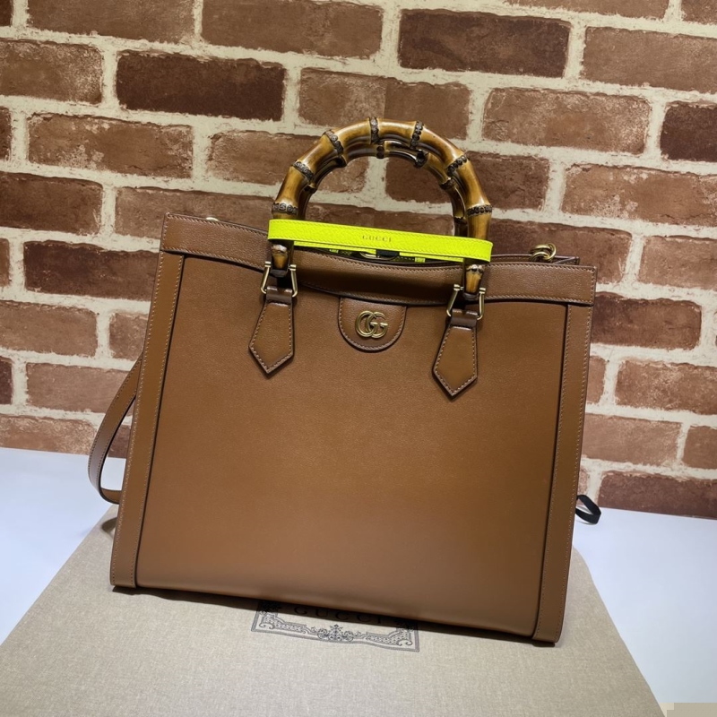 G*u*i top handle bags